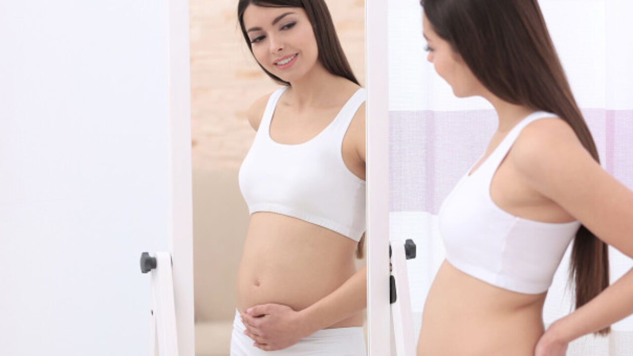 Когда начинает расти живот при беременности: чем обусловлен его рост